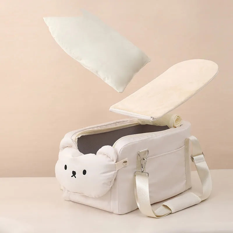 Soft beige polyester pet carrier bag with cartoon pattern for small cats and dogs