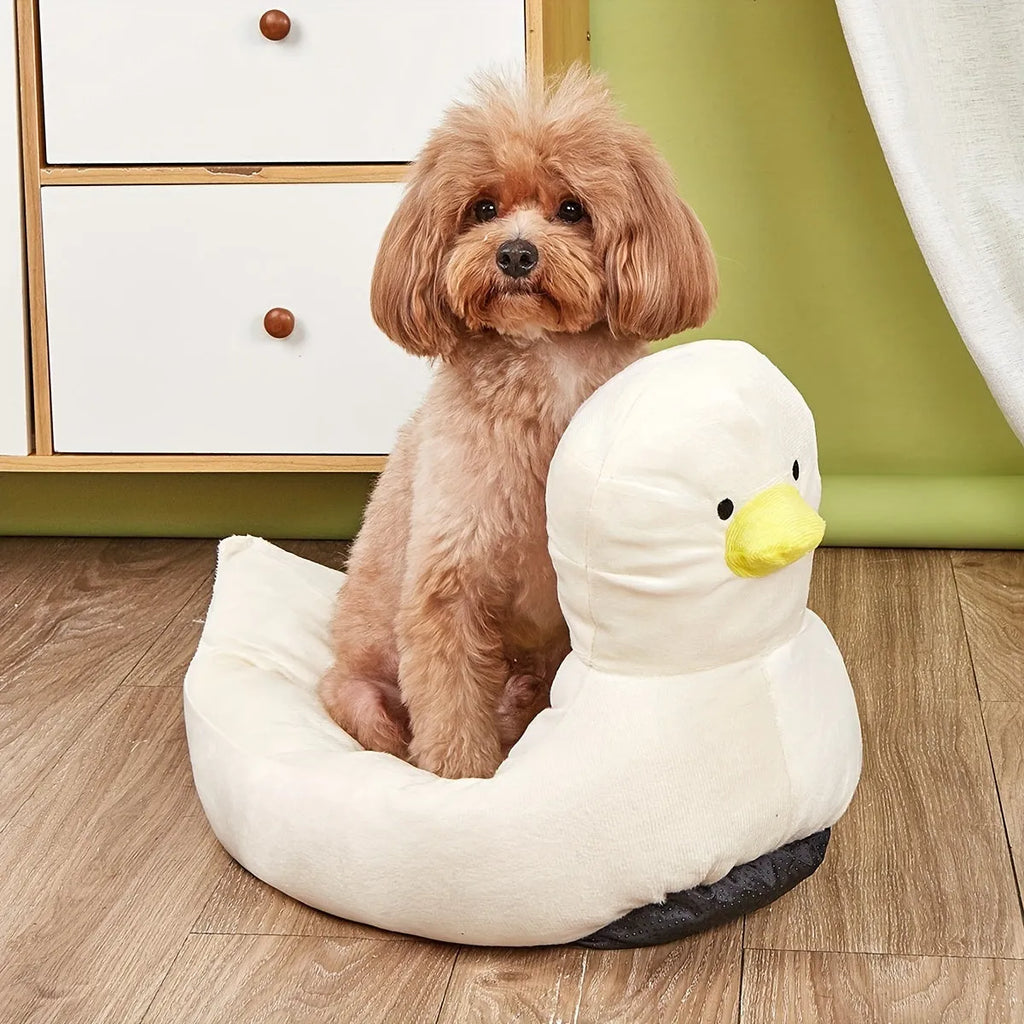 Blue duck-shaped fluffy pet bed for small dogs and cats on floor