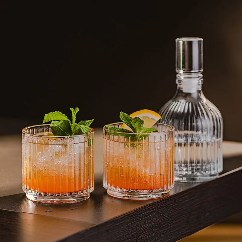 Modern simplicity clear glass whiskey cup with diamond pattern on a table, single piece
