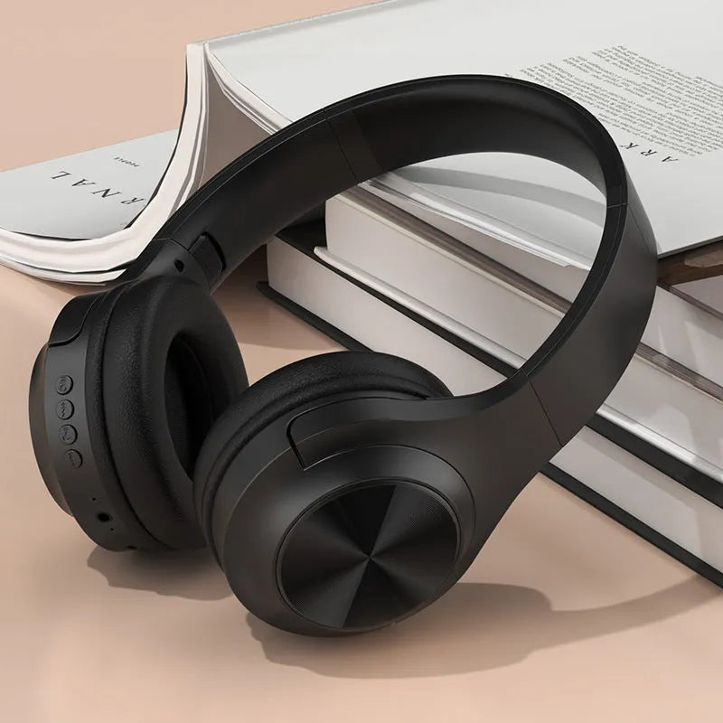 Creative design wireless Bluetooth headset shown in Ivory White, Chalk Black, and Youth Green colour options.