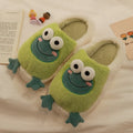Green winter cotton slippers with coral fleece lining and cartoon frog pattern on a flat sole