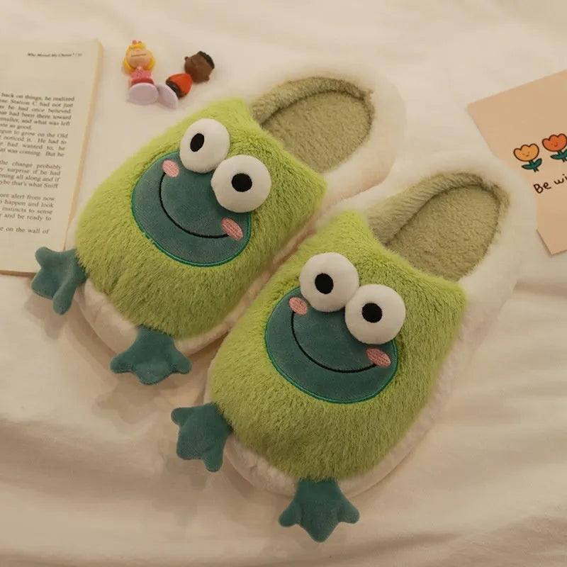 Green winter cotton slippers with coral fleece lining and cartoon frog pattern on a flat sole