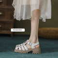 Women's black platform sandals with buckle closure and chunky hollow sole