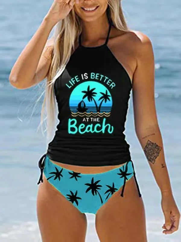 Conservative style women's swimsuit with colourful cartoon print and matching shorts.
