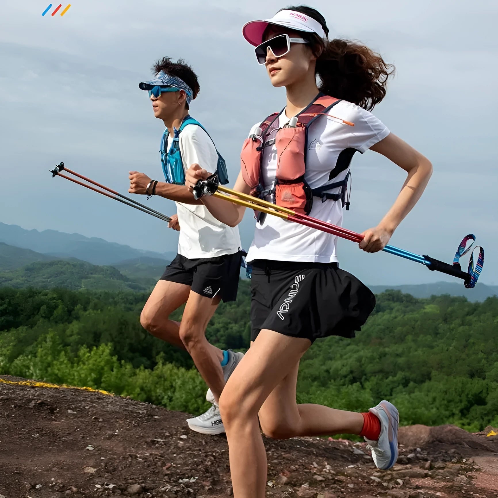 Pair of carbon fibre folding trekking poles with tungsten steel tips in colourful finish for hiking