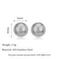 Minimalist round ball stud earrings in gold and silver plating on a white background.