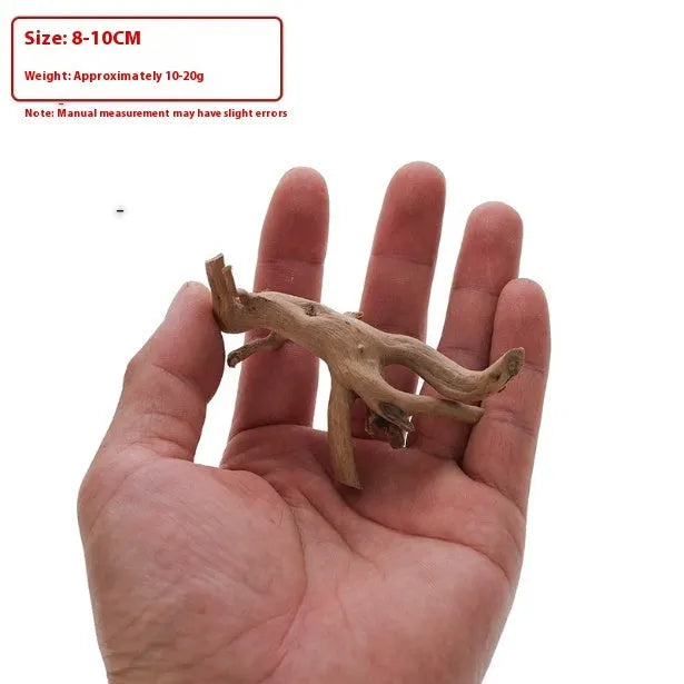 Natural Xiaoqi root wood aquarium decoration on a white background, showing branched, driftwood shape.