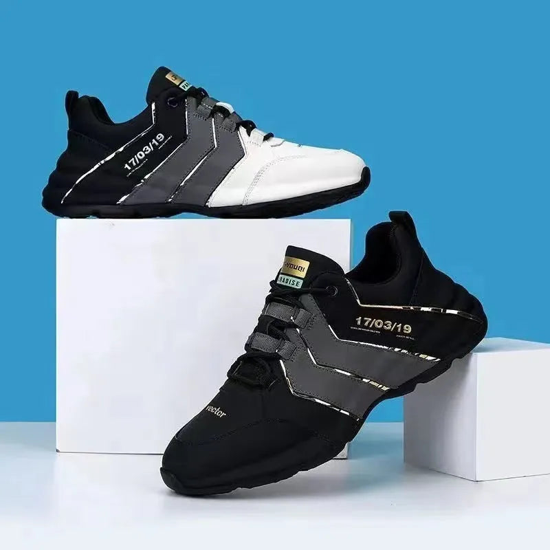 Casual low-top sneakers with a thick plastic sole and mesh lining in grey and black colourway.