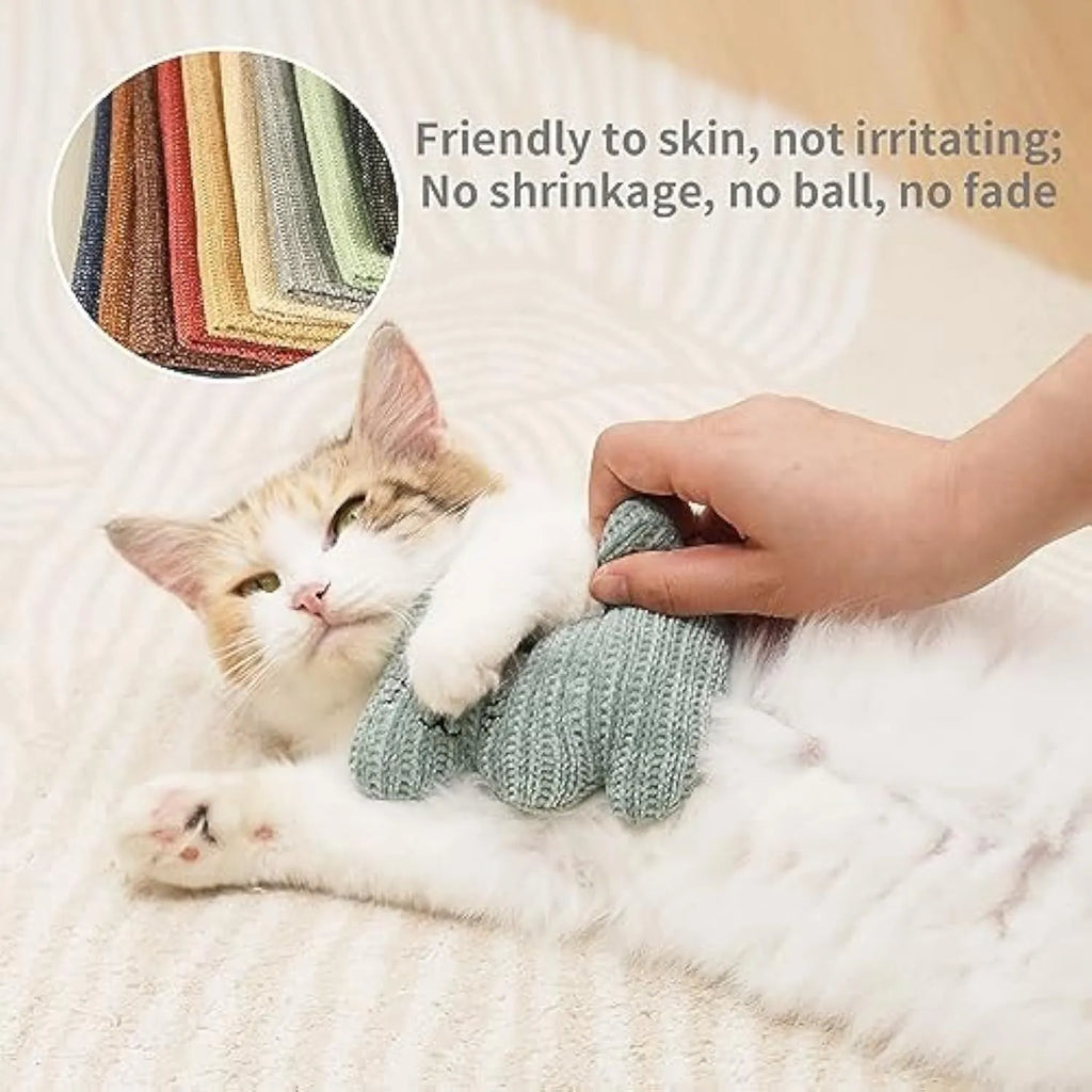 Cyan plush cat toy with bell and catnip, measuring 12cm by 11cm, on a white background