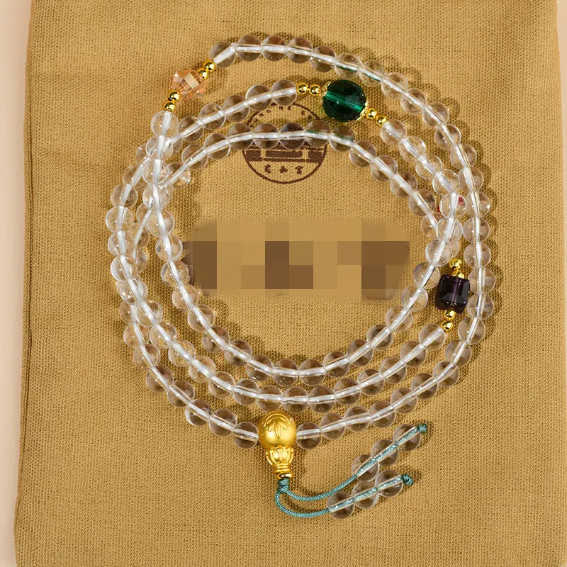 White crystal 108 bead rosary bracelet with geometric ethnic design