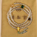 White crystal 108 bead rosary bracelet with geometric ethnic design
