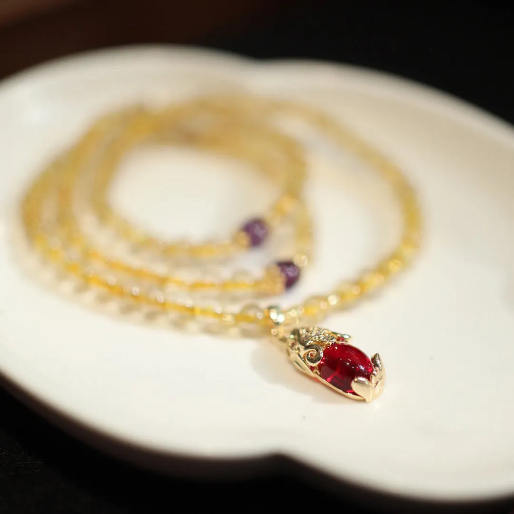 Natural Brazil gold rutilated quartz bracelet with Chinese style design and three gold rings