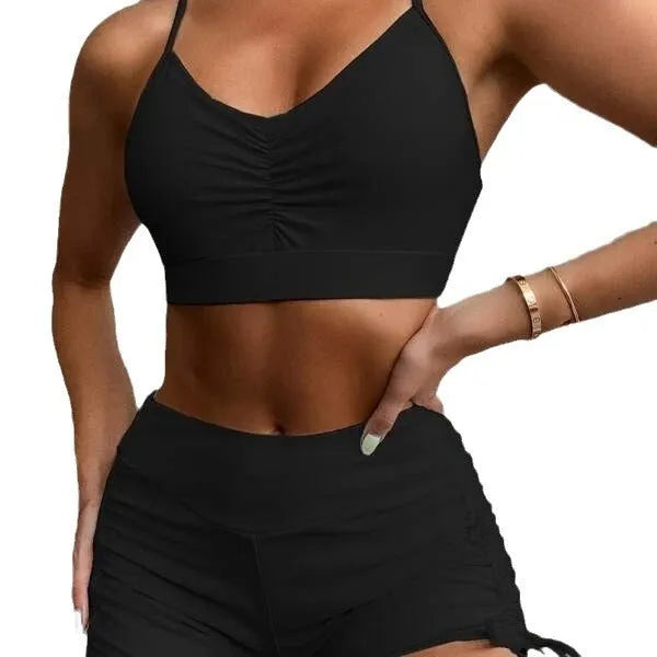 A purple high-waist split swimsuit for women, showing the bikini briefs style and sleeveless design.