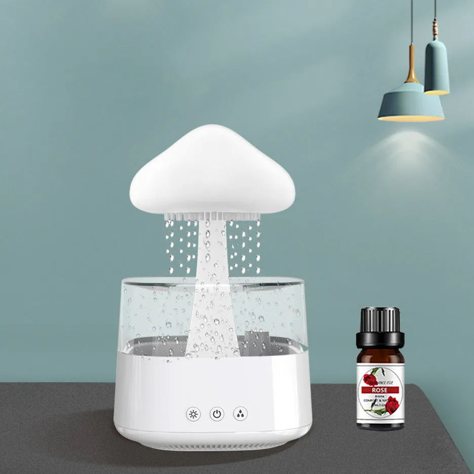 Desk humidifier with raining cloud design, essential oil diffuser, and mushroom lamp night light
