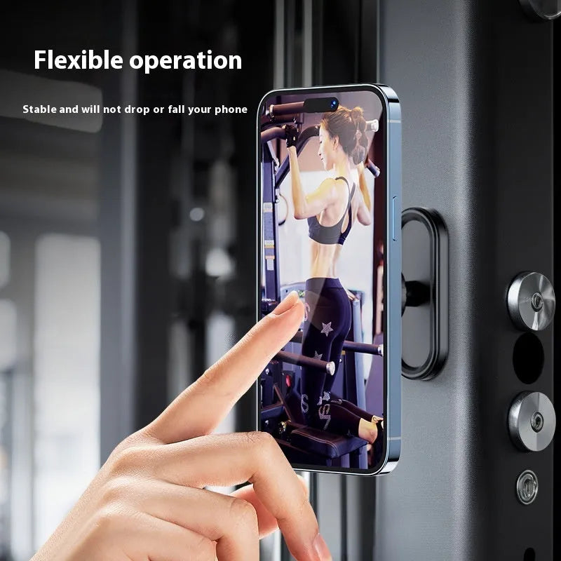 Double-sided magnetic photography bracket showing plastic construction with universal mounting design