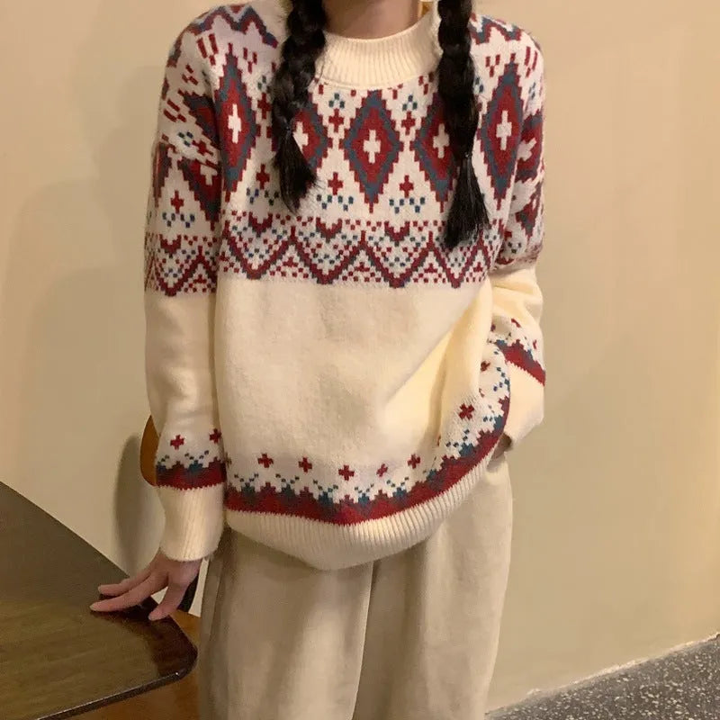 Red and white striped loose-fitting long-sleeved knitted pullover top on a model.