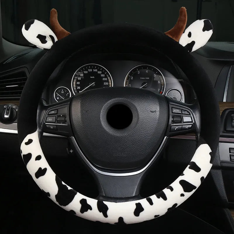 Short plush steering wheel cover in black showing protective grip design