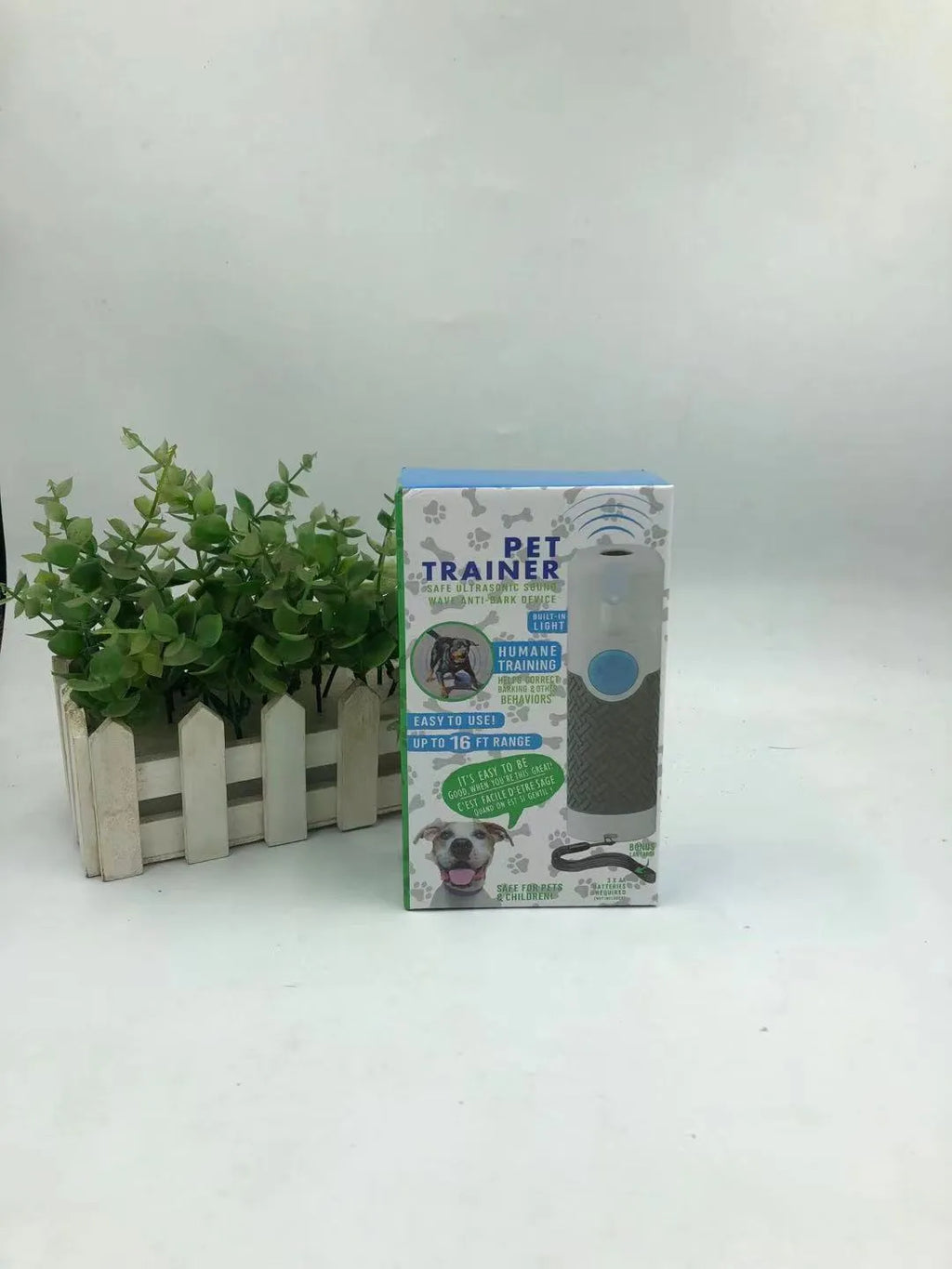 White handheld ultrasonic dog trainer device with LED indicator for bark control