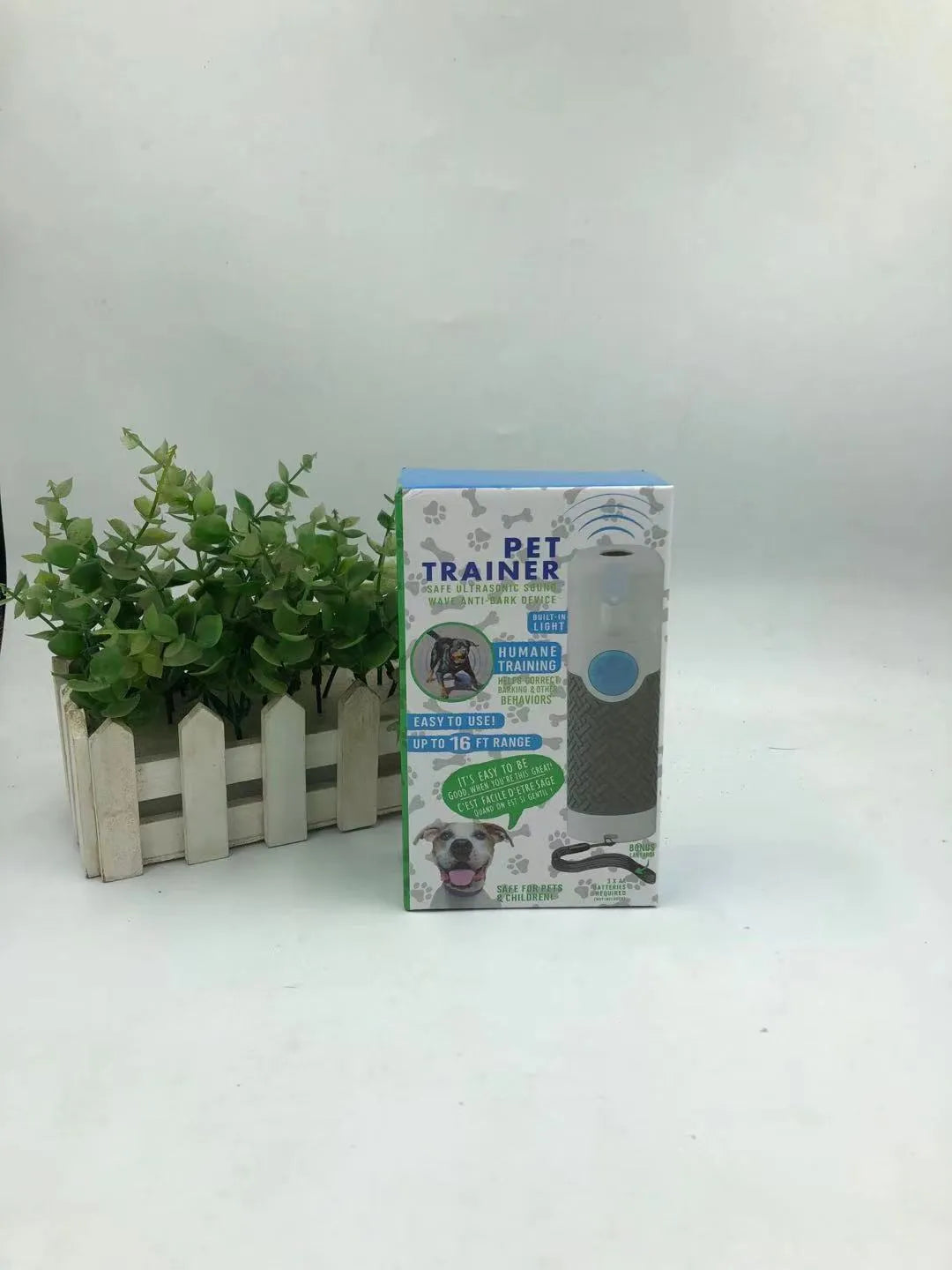 White handheld ultrasonic dog trainer device with LED indicator for bark control