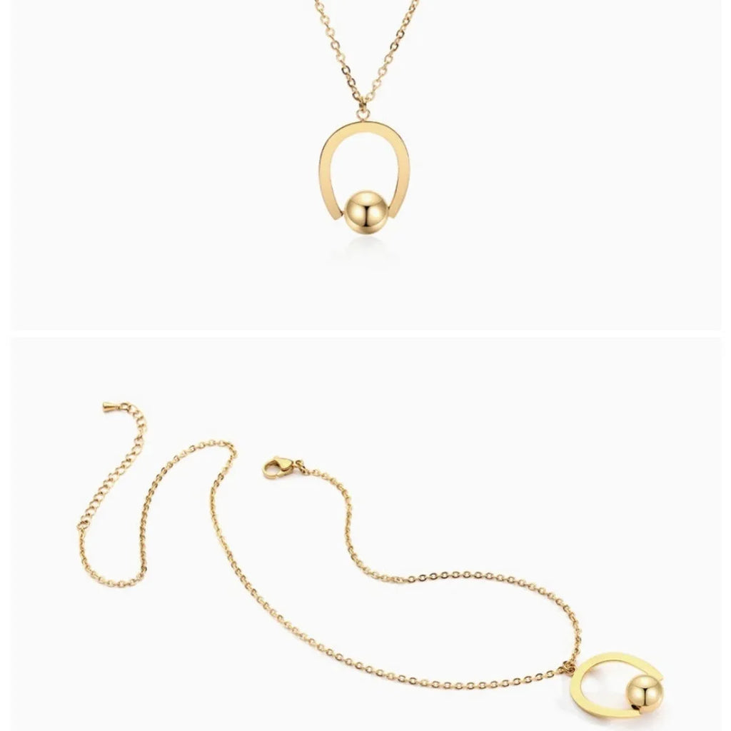 Gold or silver adjustable stainless steel necklace with a geometric pendant on a cross chain.