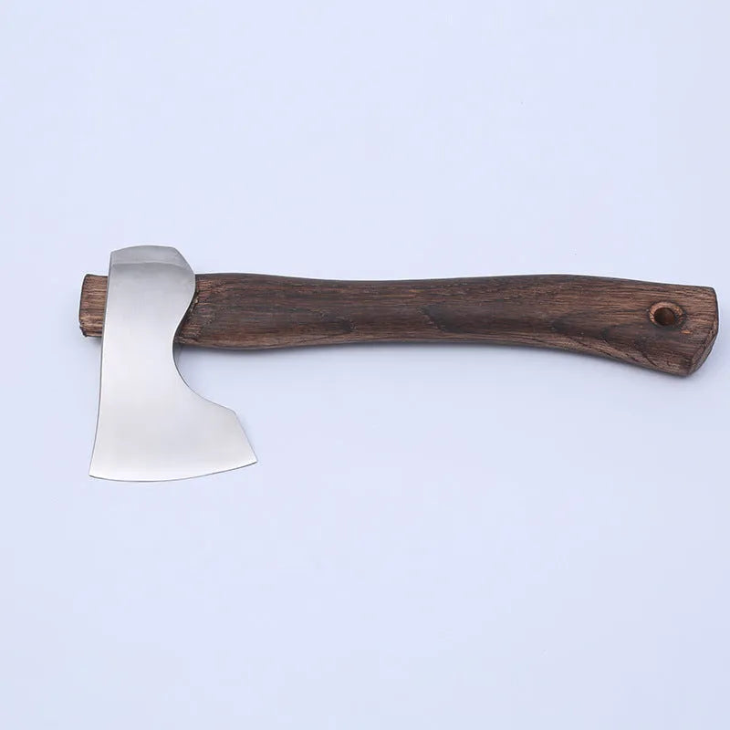 Camping axe with high carbon steel blade and wooden handle on a neutral background.