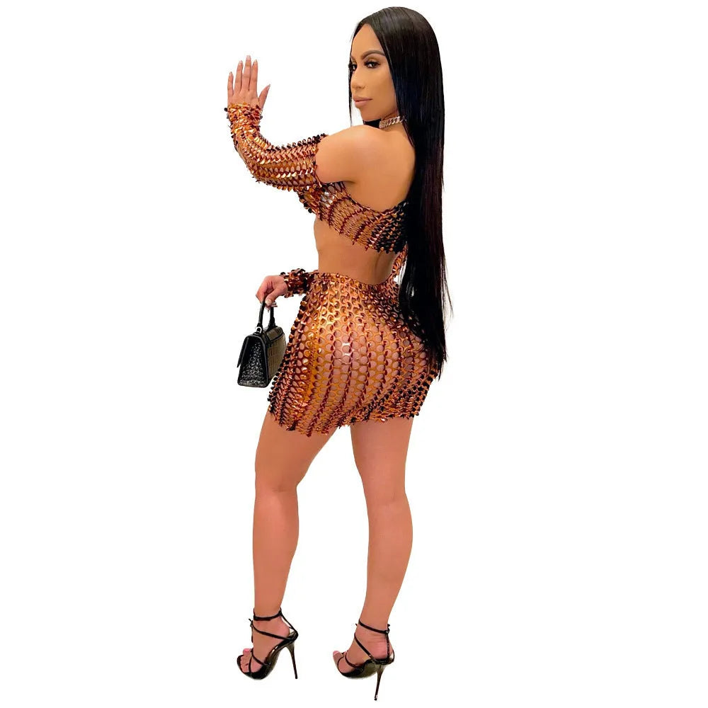 Women's sleeveless hollow-out two-piece dress set in polyester, showing top and short skirt with net hole detail.