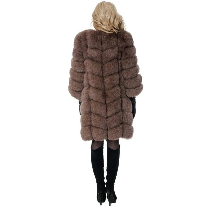 Women's long black artificial fur coat with regular sleeves.