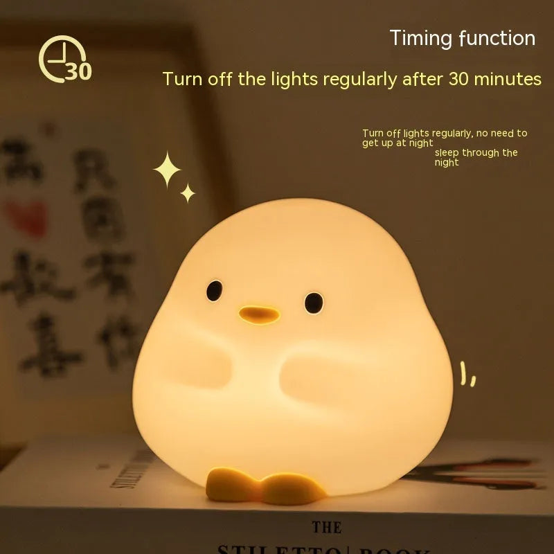 Cute duck LED night lamp in silicone with USB charging, touch sensor, and 125mm x 105mm x 110mm size
