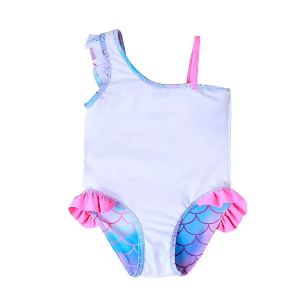 Girls' one-piece swimsuit with cartoon scale print and flounced gradient design in high elasticity nylon.