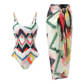 Women's two-piece swimsuit set with striped pattern and coordinating hip skirt on beach background