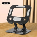 Black foldable laptop stand with metal grid design and height adjustment, placed on a desk with a laptop