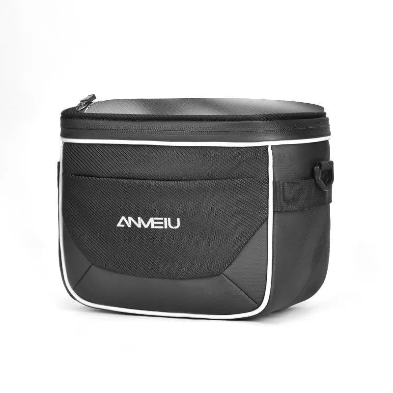 Black folding bicycle bag with hanging strap attached to handlebars