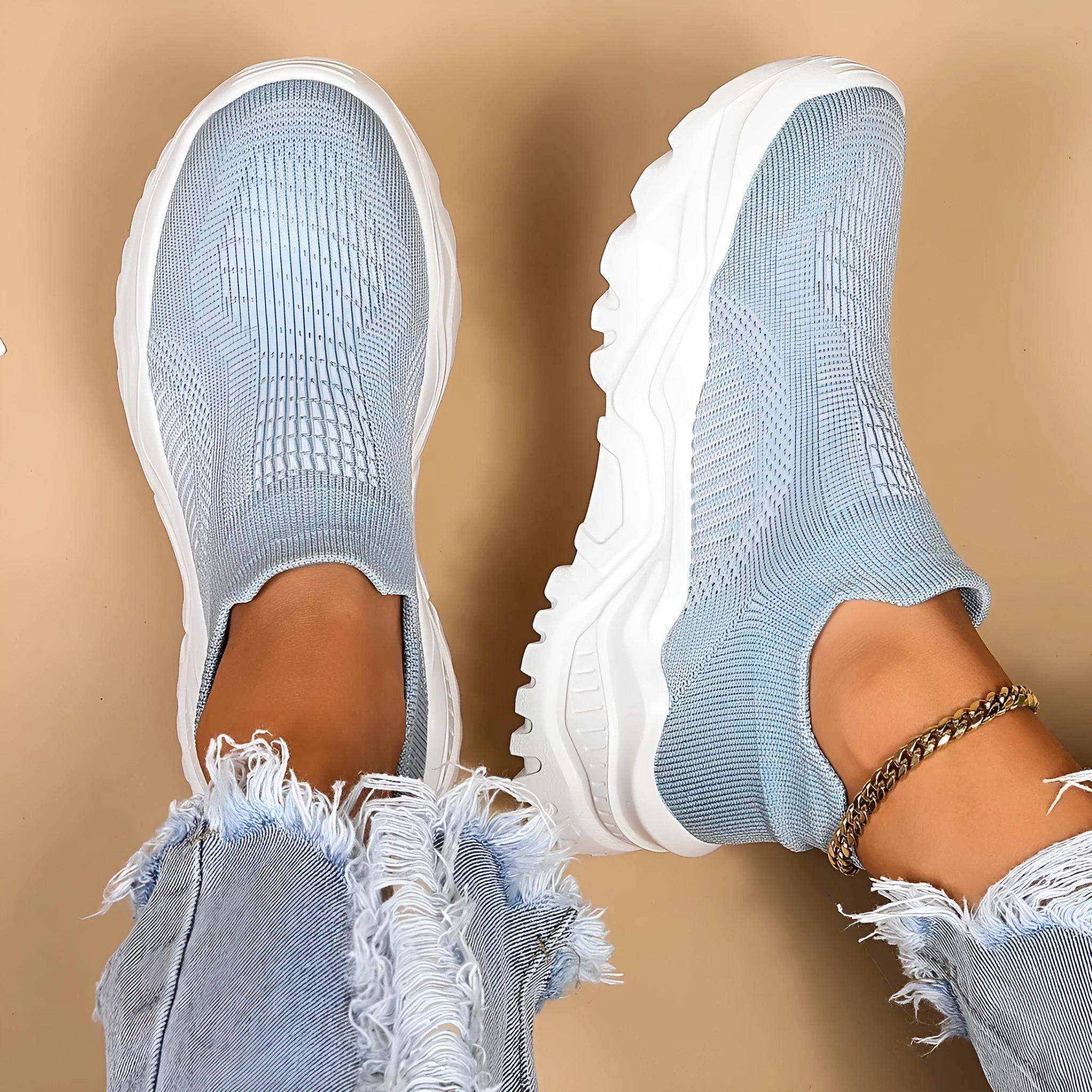 Women's light blue mesh slip-on sports shoes with round toe and mid heel