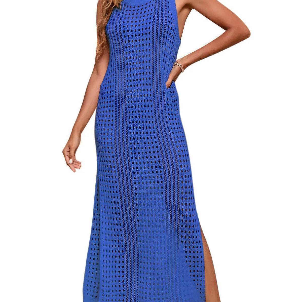 Long loose solid colour beach cover-up blouse with hollow-out knitted design on a hanger.