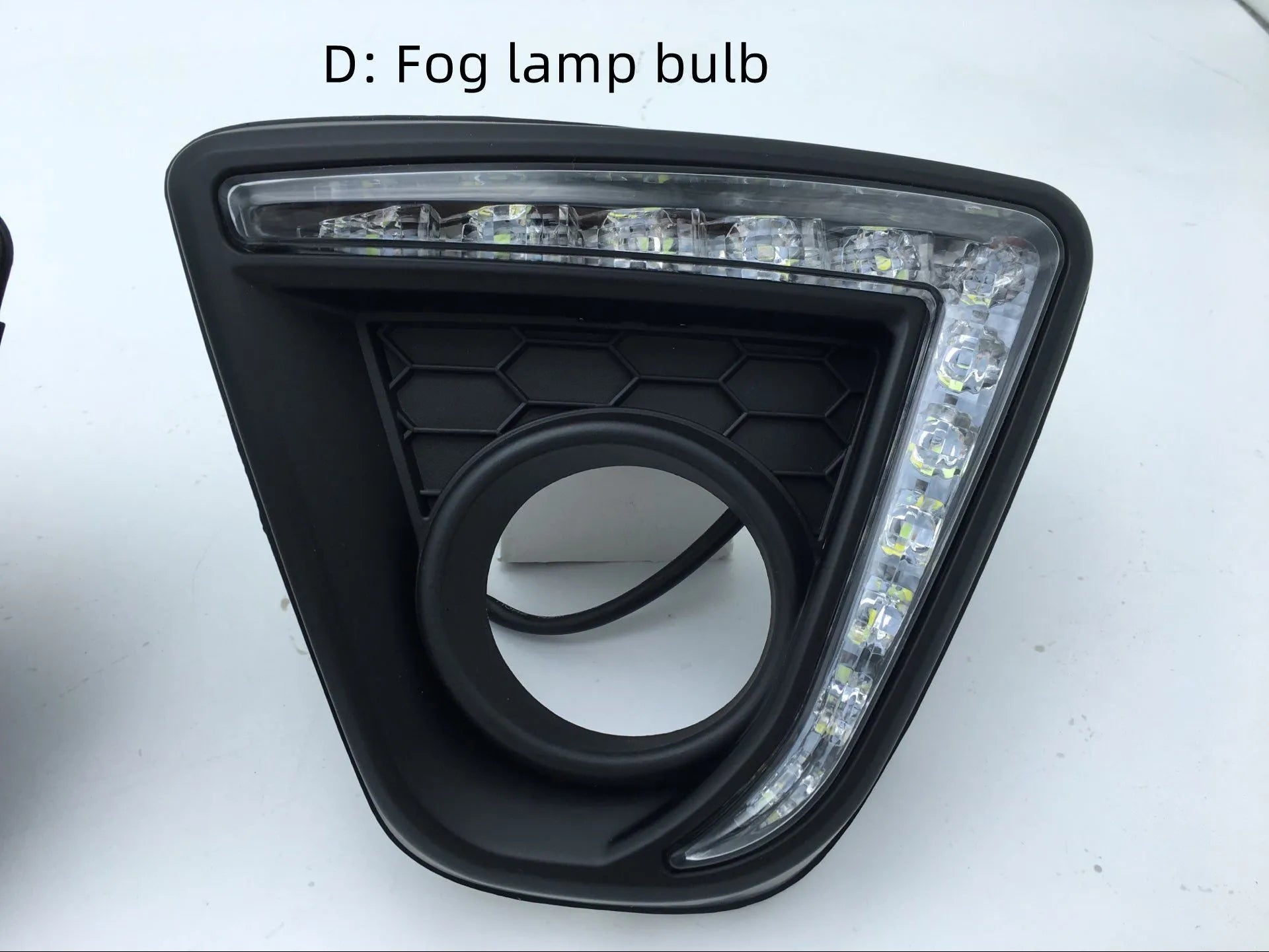 Set of two silver electroplated daytime running light units for a Mazda CX-5 car.