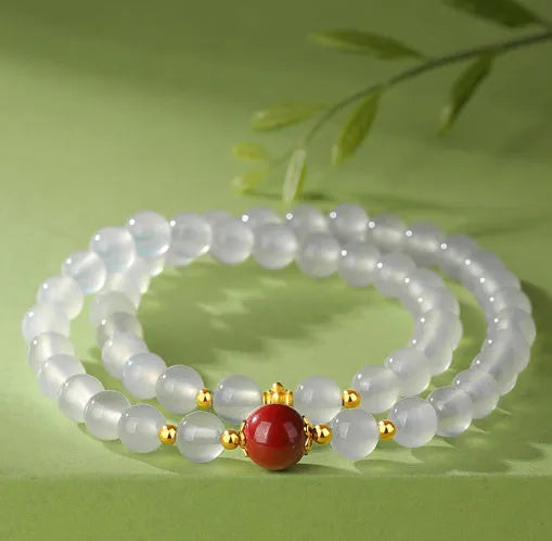 Women's white agate double layer bracelet with jequirity bean cinnabar detailing and geometric beads
