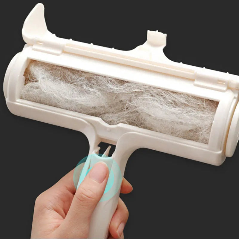 White reusable pet hair remover roller on fabric furniture