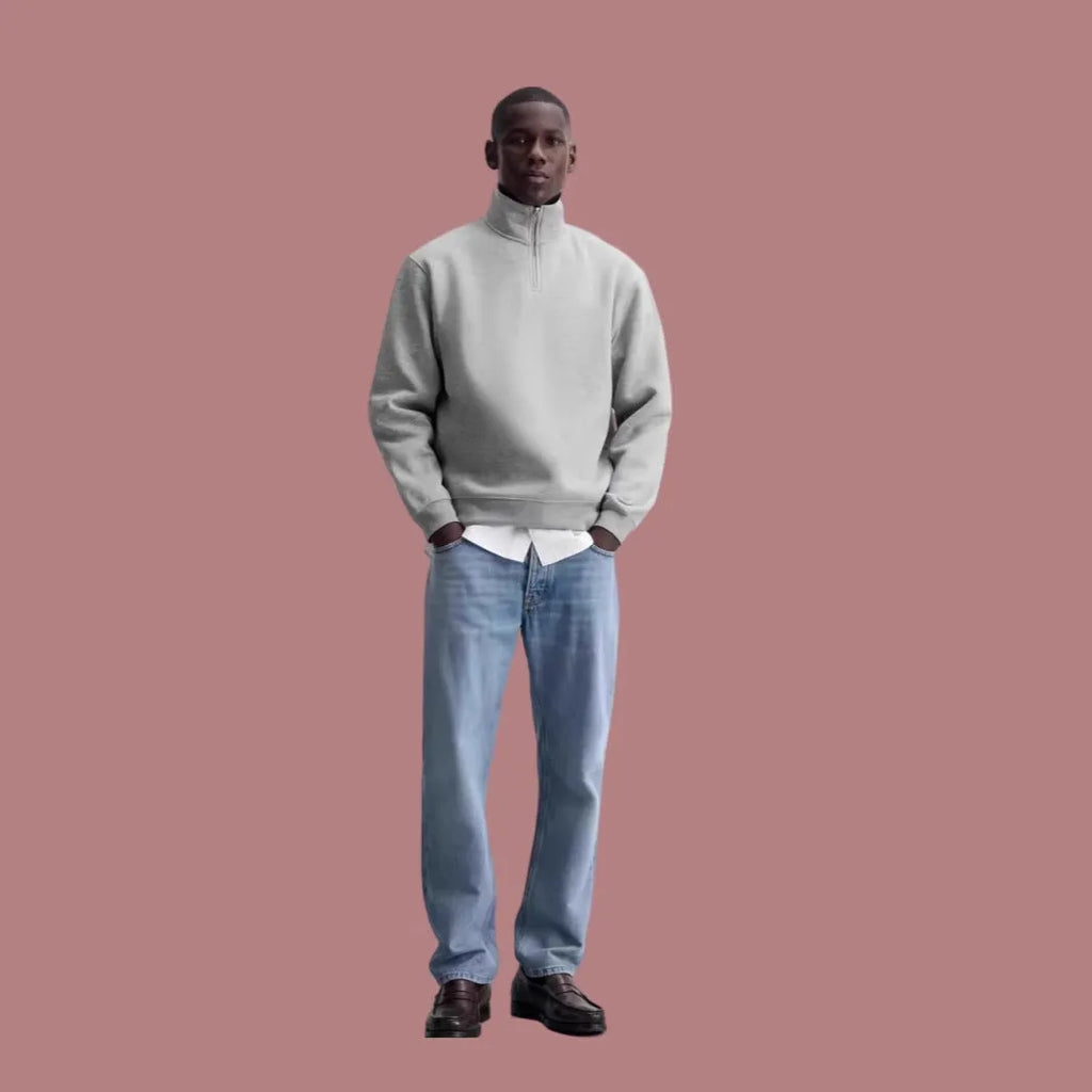 Grey half zipped stand collar cotton sweater hoodie for men and women on a hanger