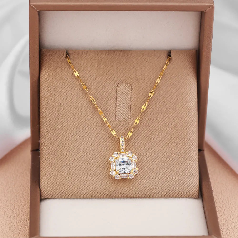 Women's geometric titanium steel clavicle necklace with gemstone-inlaid pendant on a water wave chain.