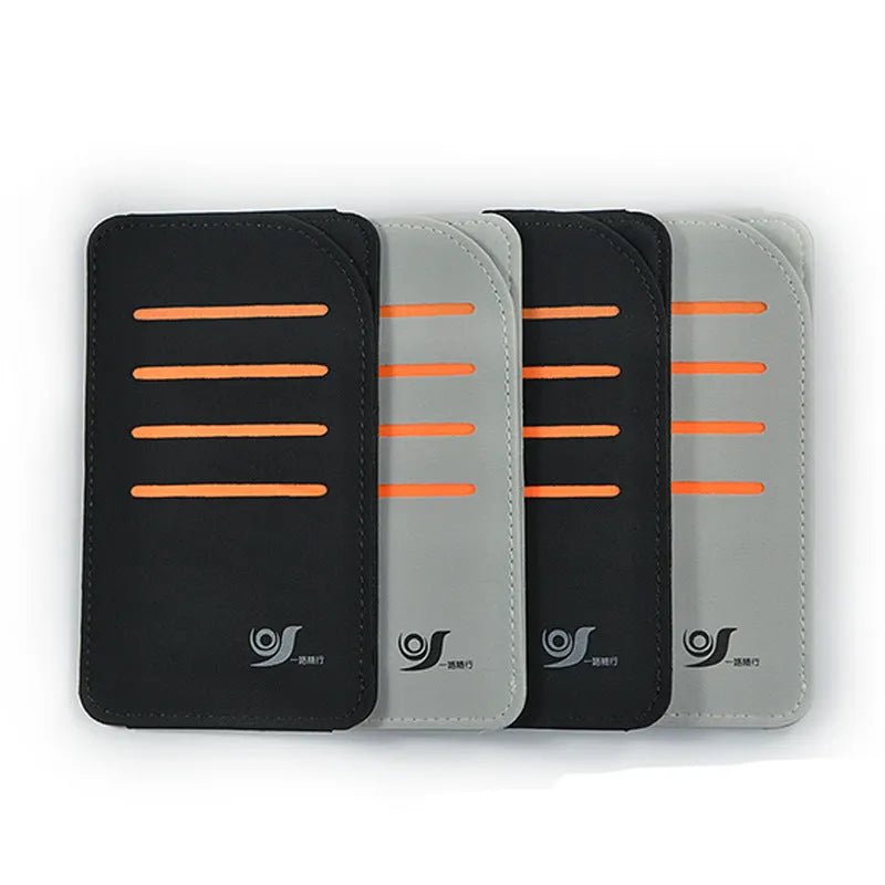 Car sun visor organiser shading panel in black or grey, holding sunglasses and cards.