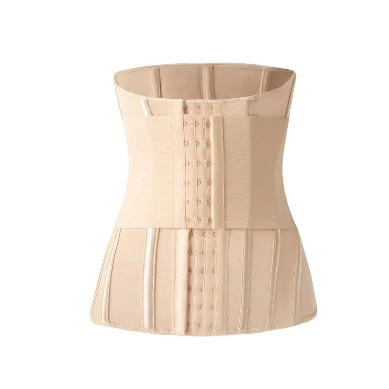 Nylon belly band waist trainer in apricot colour with an adjustable tie, laid flat.