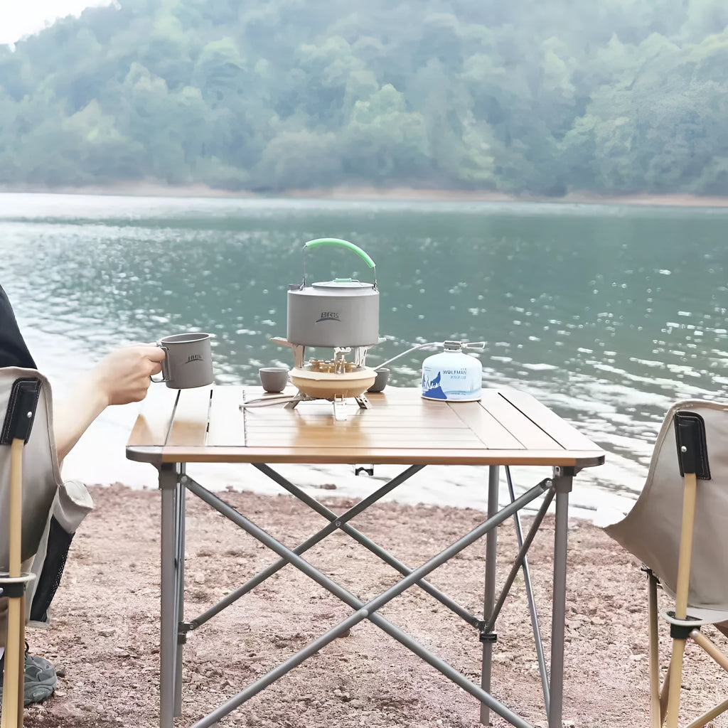 Portable windproof gas stove for camping and picnic in black, compact design for 1-2 people