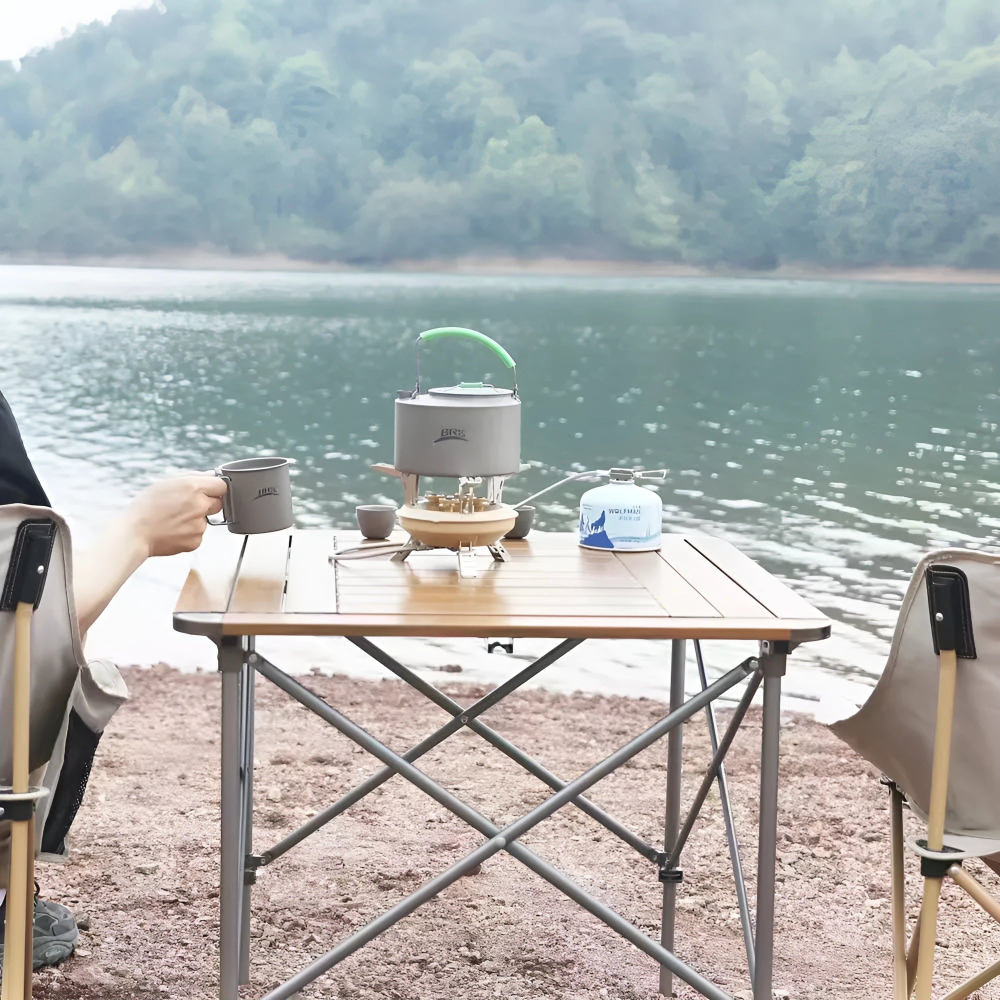 Portable windproof gas stove for camping and picnic in black, compact design for 1-2 people