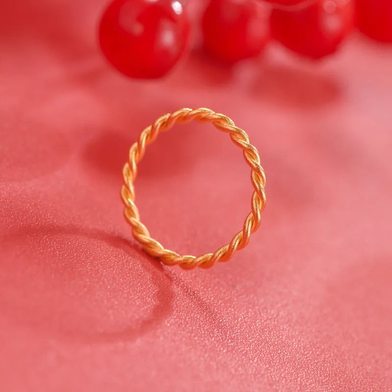 Women's brass gold plated ring showing simple bracelet and twist design options in glossy and matte finishes