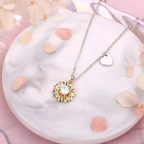 925 sterling silver sunflower pendant necklace on a cross chain, adjustable from 21cm to 50cm.