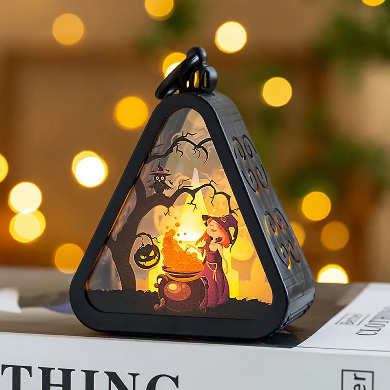 Small plastic Halloween pumpkin lamp and themed decoration props in four colour variants.