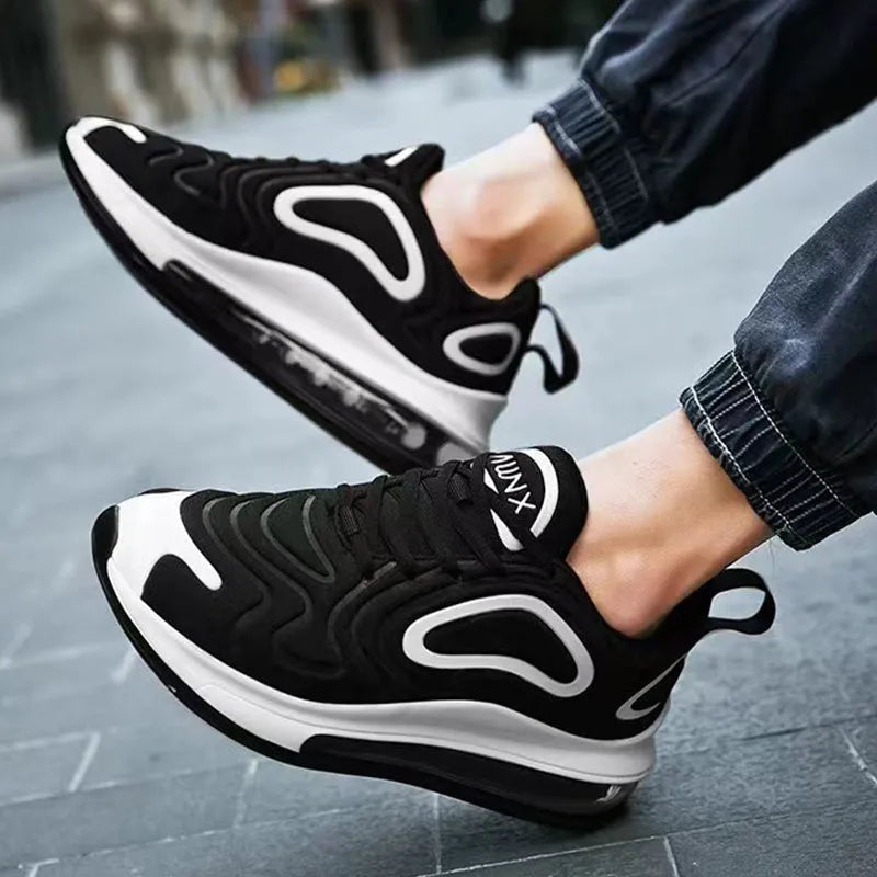 Men's black air cushion casual sneakers with lace-up front and thick sole