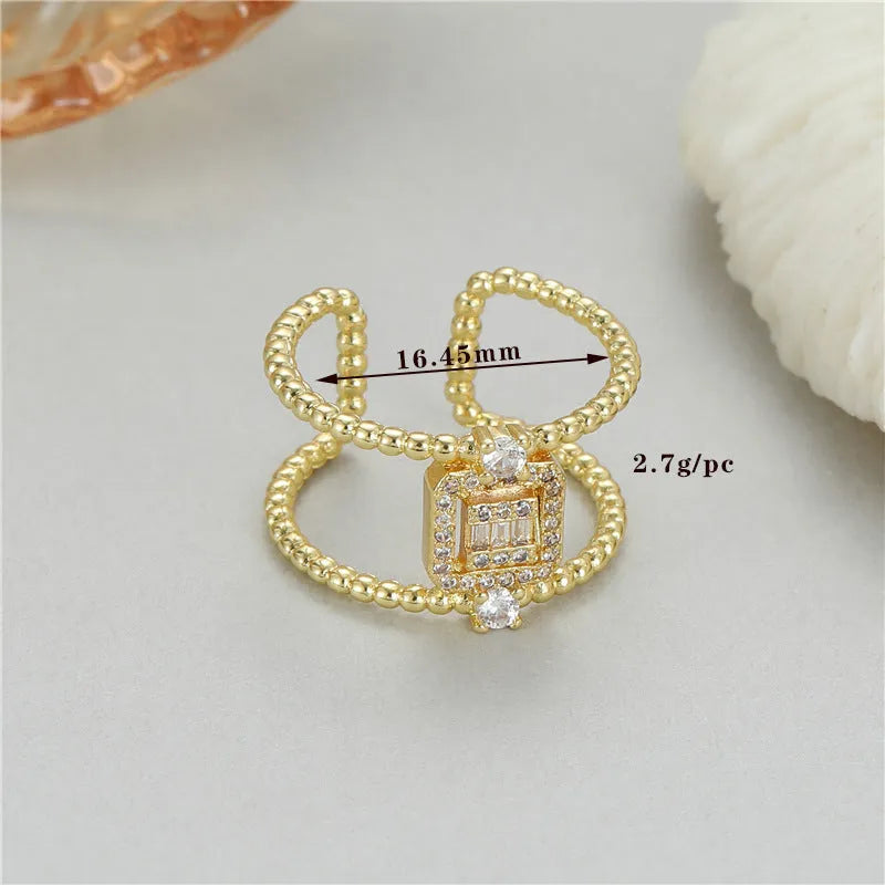 Adjustable open ring with 14K copper-plated gold finish and asymmetric U-shape design