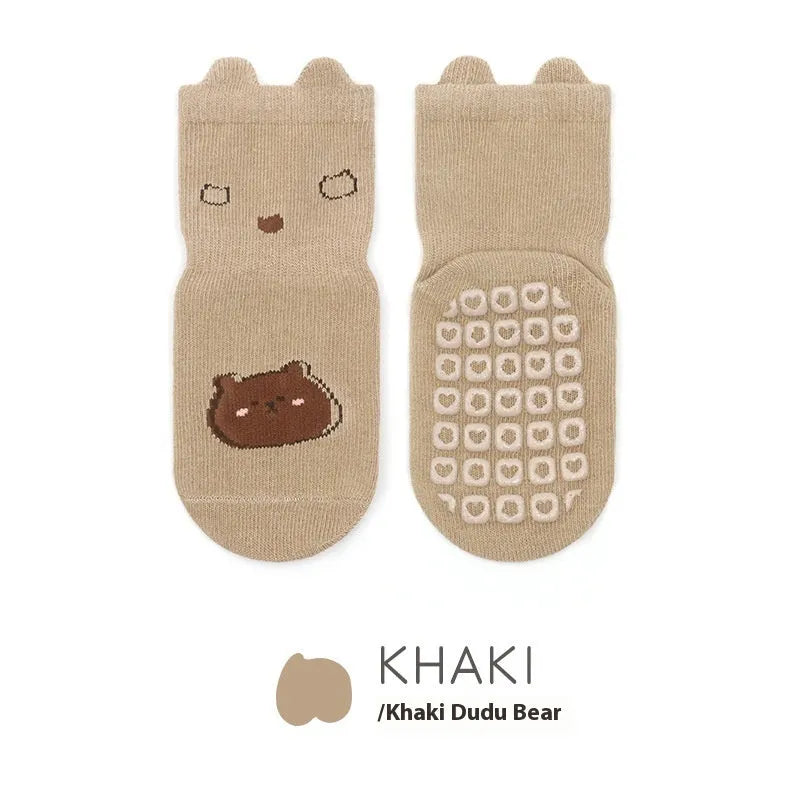 Cotton short tube socks in beige smiley face design for children - free size trampoline socks