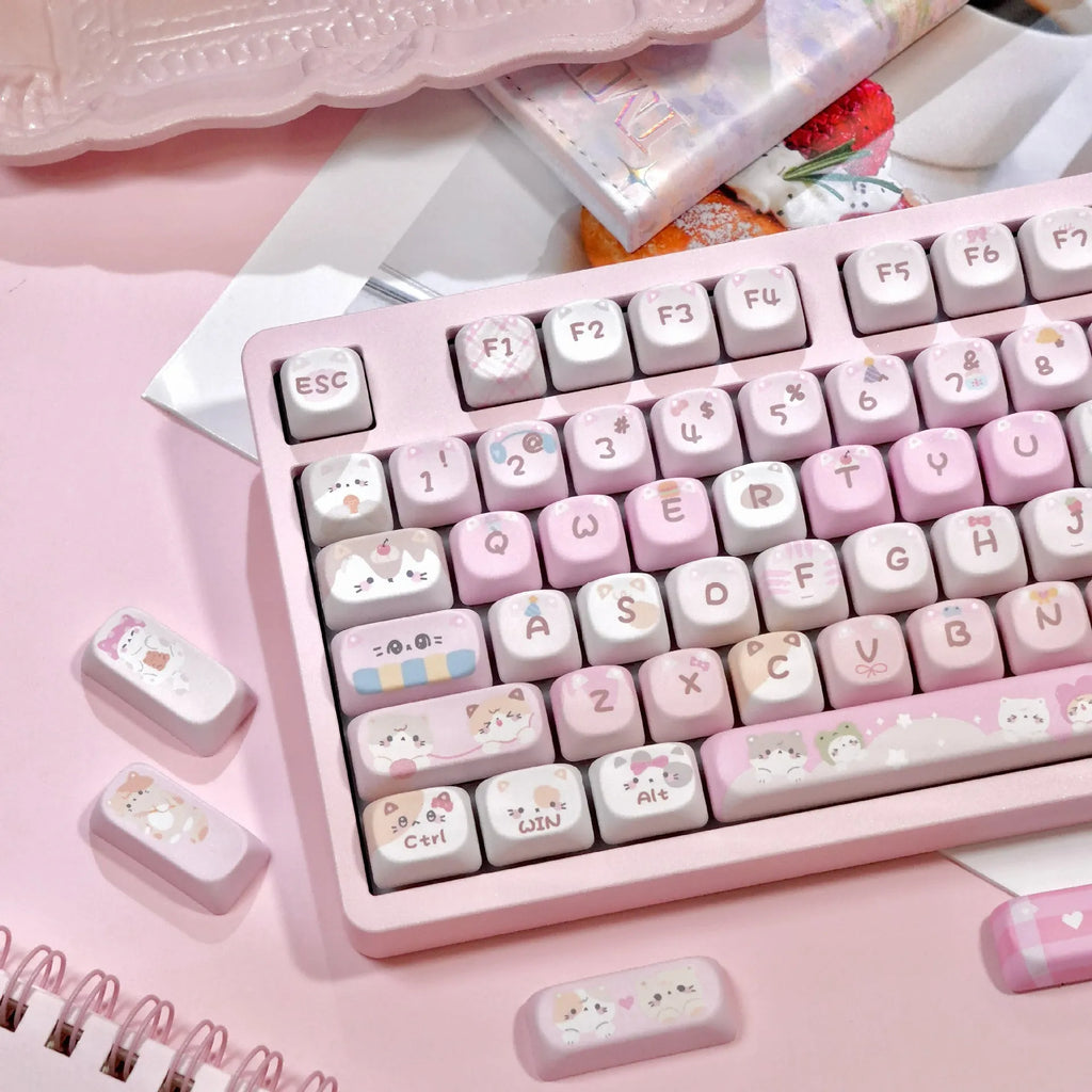 Pink MOA height mechanical keyboard keycaps with cartoon artwork on all five sides